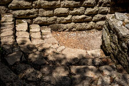Building ruins. Beautiful warm spring day and archeological ruins at Butrint National Park, Albania, UNESCO heritage. Travel photography with fresh green floraの写真素材