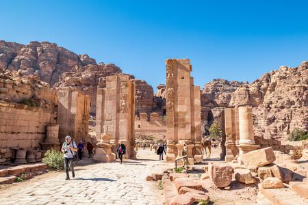 PETRA, JORDAN - JANUARY 30, 2020: Columns seen when tourist walking the scenery Street of Facades...