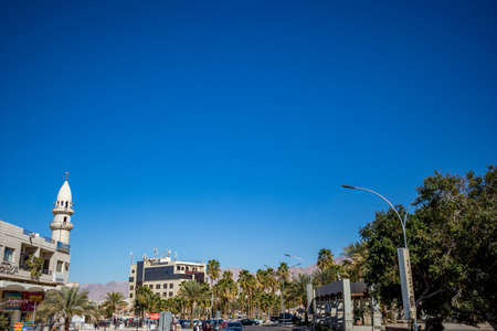 AQABA, JORDAN - FEBRUARY 2, 2020: Elevated sunny winter afternoon view at the main city boulevard at the sea establishment Aqaba, Jordan. Cloudless clear sky winter day. Horizontal frameのeditorial素材