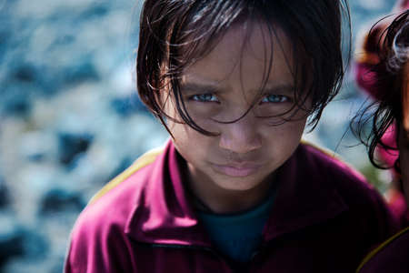 Almora, Uttarakhand/ India - 04 December, 2019: A female child going to school near Haidakhan Ashram located in  Uttarakhand, Indiaのeditorial素材