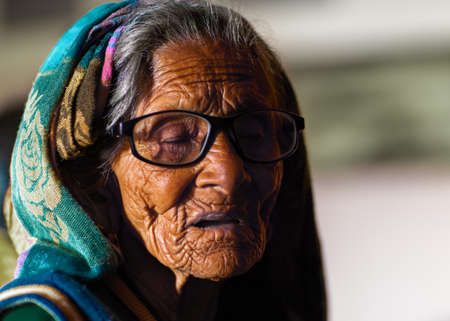 Uttrakhand, India - 05 November, 2019: An old beautiful women narrating story of her life.のeditorial素材