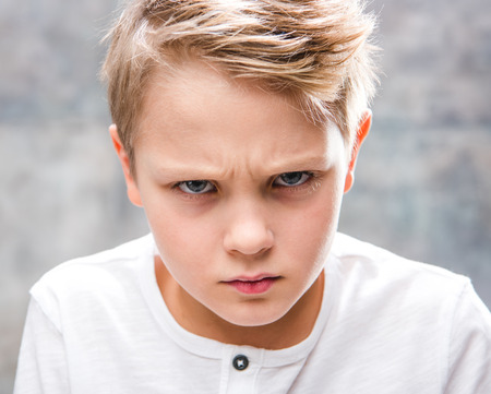 Close-up portrait of cute little boyの写真素材