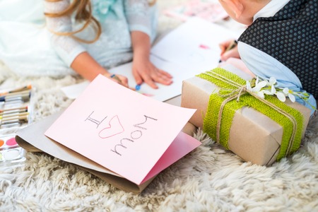 Siblings preparing presentの写真素材