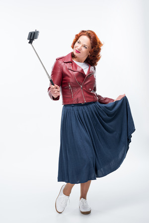 Woman taking selfieの写真素材