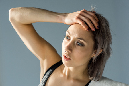 portrait of tired sporty womanの写真素材
