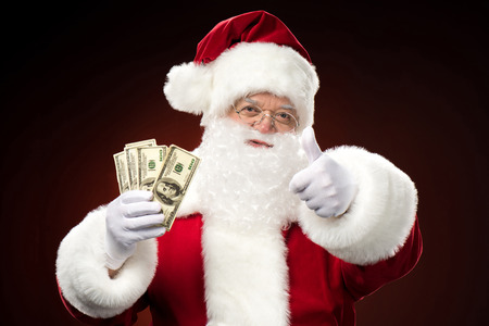 Santa Claus with dollarsの写真素材