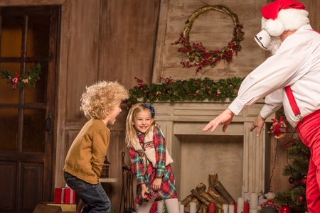 Santa Claus playing with childrenの写真素材