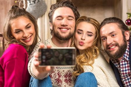 Happy people taking selfieの写真素材