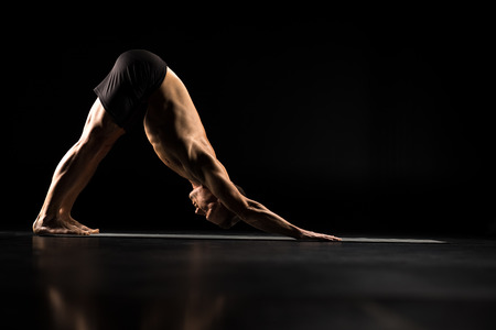 Man standing in yoga position