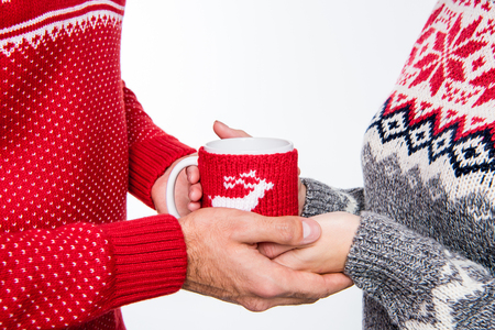 Couple holding cupの写真素材