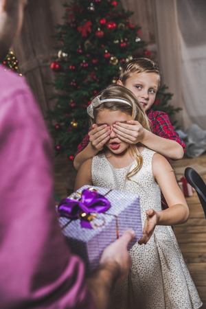 Girl receiving present