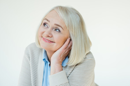 portrait of dreamy senior woman