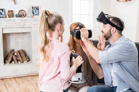 Family in virtual reality headsetsの写真素材