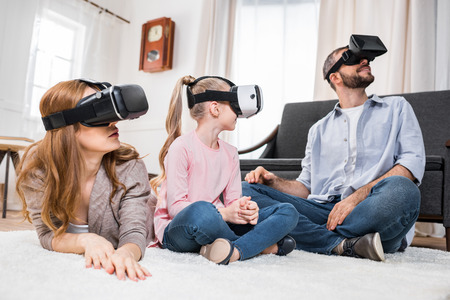 Family in virtual reality headsetsの写真素材