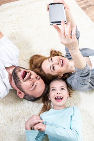 Family making selfieの写真素材