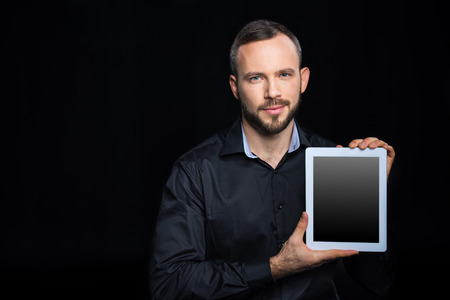 Man with digital tabletの写真素材