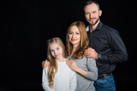 Happy family standing togetherの写真素材