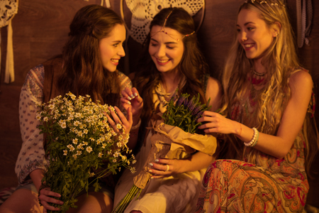 Young women with flowersの写真素材