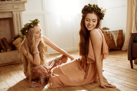 Women in floral wreathsの写真素材