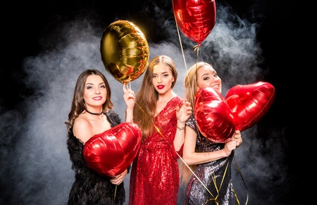 Gorgeous women with balloonsの写真素材