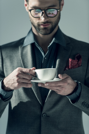 Man with coffee cupの写真素材