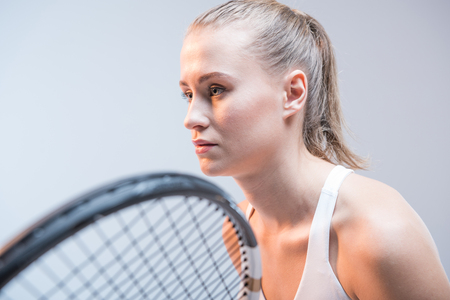 Young woman playing tennisの写真素材