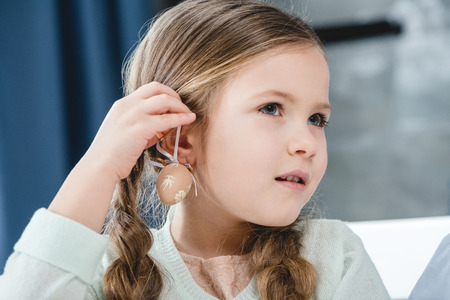 Girl with easter decorationの写真素材