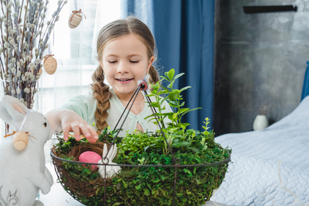 Girl with easter eggの写真素材