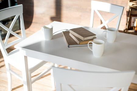 Books stacked on table