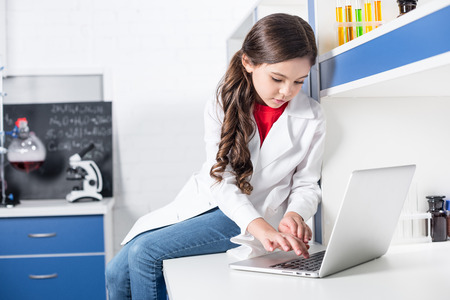 Girl using laptopの写真素材