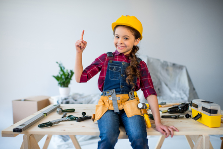 Little girl in tool beltの写真素材