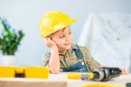 Little boy in workshopの写真素材