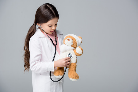 Little girl playing doctorの写真素材