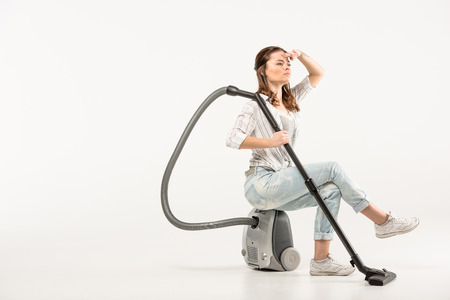 Woman with vacuum cleanerの写真素材
