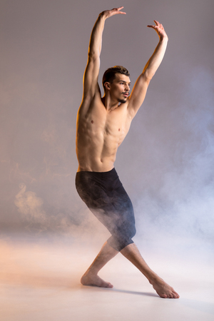 Young man dancingの写真素材