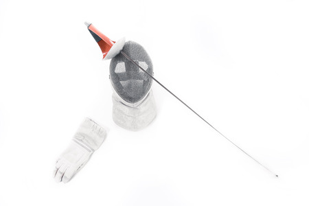 Professional fencing equipment, mask, glove and rapier isolated