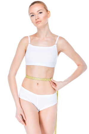 Woman with measuring tapeの写真素材