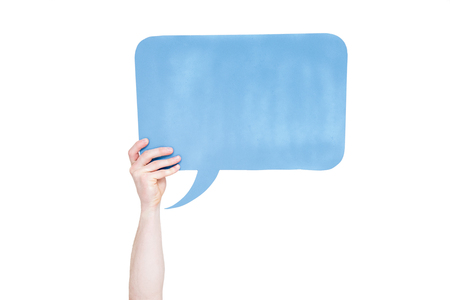 person holding blue empty speech bubble with copy space isolated