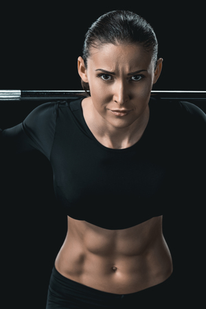 fitness woman training with barbellの写真素材