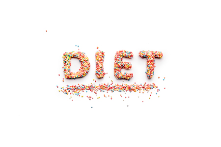 Top view of word diet made from sweets isolated on whiteの写真素材