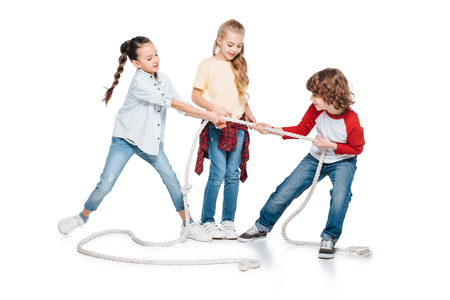 Kids play tug of warの写真素材