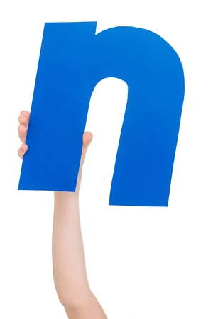 alphabet letter in child handの写真素材