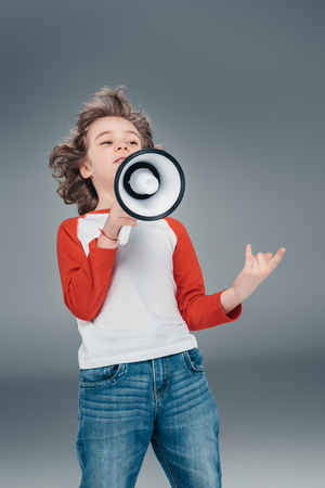 Boy using loudspeakerの写真素材