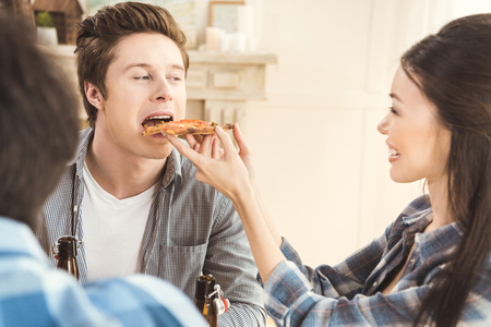 Woman feeding boyfriendの写真素材