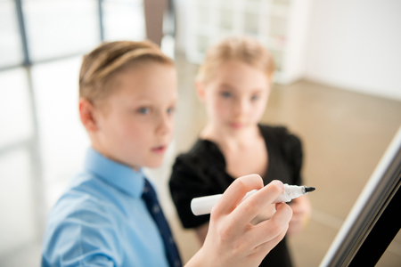 Children in formal clothesの写真素材