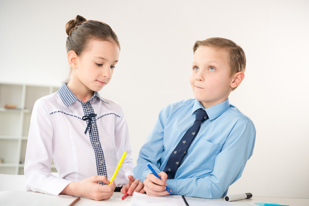Children working in officeの写真素材