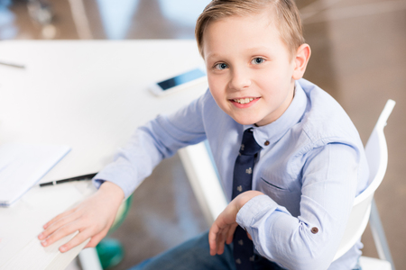 Smiling boy in formal clothesの写真素材