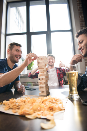 men playing wooden block gameの写真素材