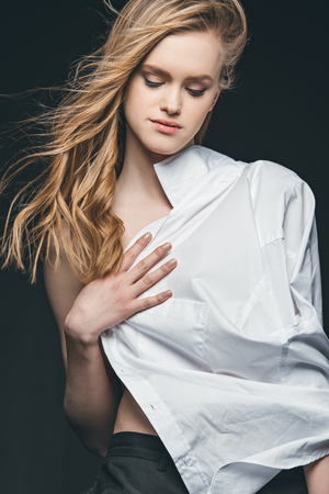 girl wearing white male shirtの写真素材