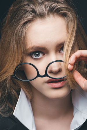 blonde businesswoman with eyeglassesの写真素材